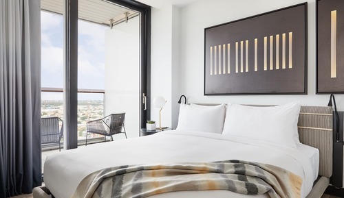Suite Deluxe, balcón, en esquina (Wraparound)