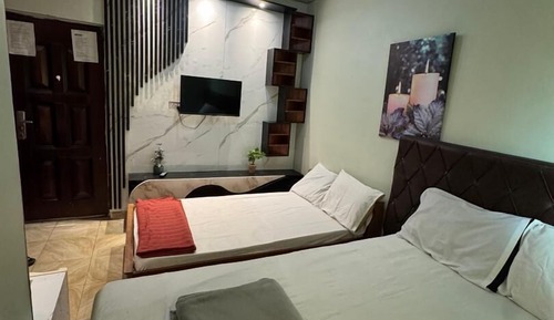 Habitación familiar con 2 camas individuales