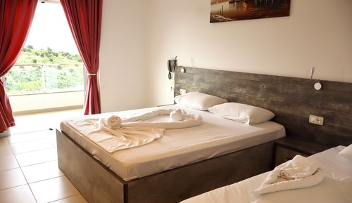 Habitación cuádruple, balcón, vistas al mar