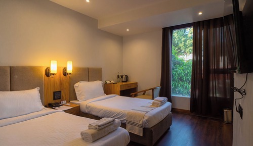 Habitación estándar con 1 cama doble o 2 individuales