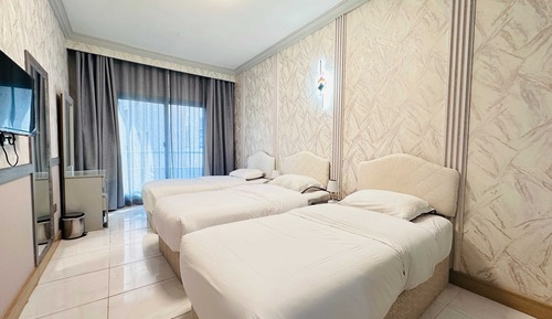Habitación triple Deluxe
