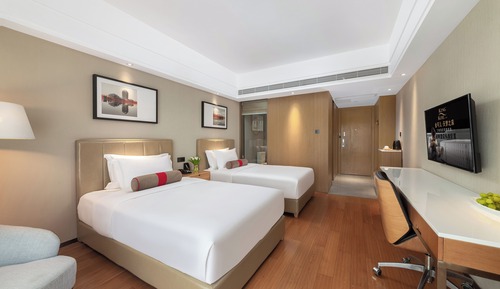 Habitación superior con 2 camas individuales, vistas a la ciudad