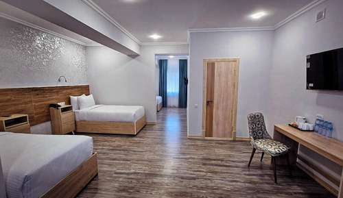 Habitación cuádruple familiar, vistas al patio