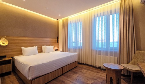 Habitación Deluxe con 1 cama doble o 2 individuales, vistas a la ciudad