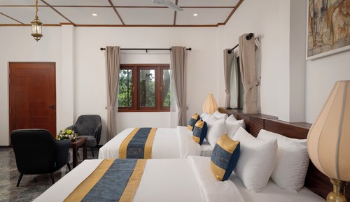 Deluxe Triple Room, Balcony, Garden View