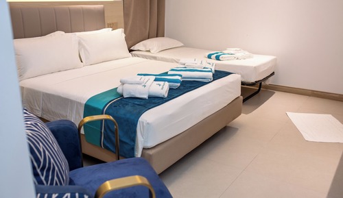 Habitación triple Deluxe
