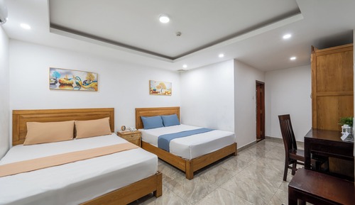 Habitación familiar con 2 camas individuales, vistas a la ciudad