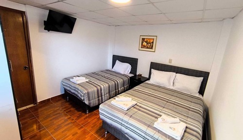 Habitación triple, vistas a la ciudad