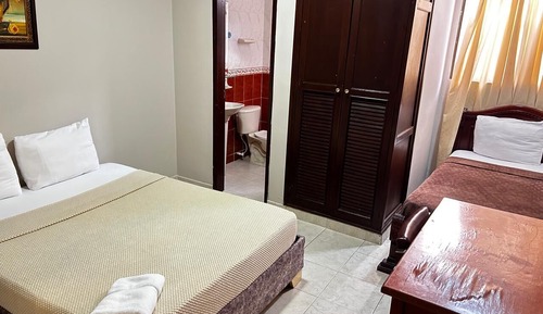 Habitación triple estándar, varias camas