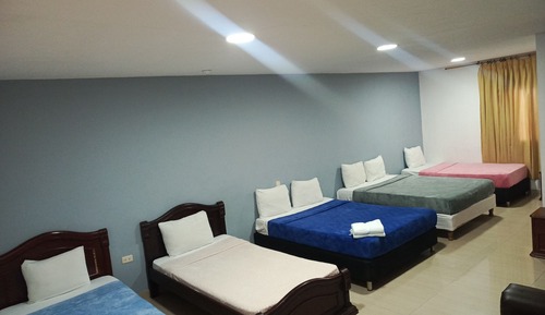 Habitación familiar, varias camas