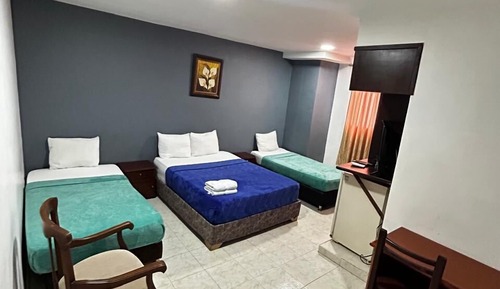 Habitación cuádruple estándar, varias camas