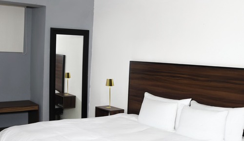 Habitación Confort con 1 cama doble o 2 individuales