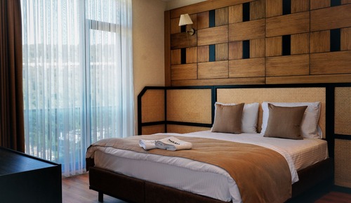 Habitación triple, vistas al jardín