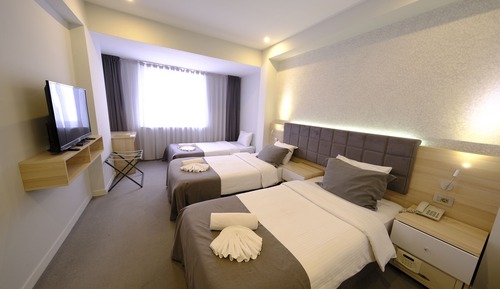 Habitación triple Deluxe