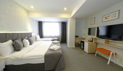 Habitación cuádruple Deluxe