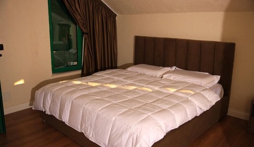 Habitación triple Deluxe, patio