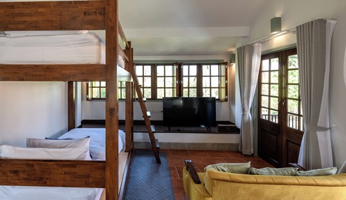 Habitación cuádruple familiar, vistas al jardín