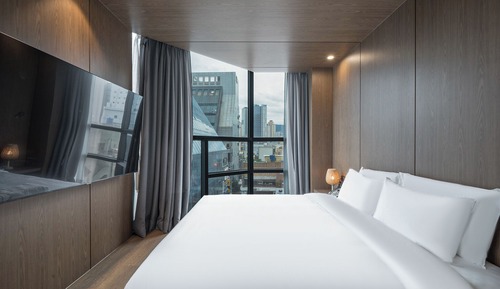 Habitación doble, 1 cama de matrimonio grande, vistas a la ciudad, en esquina