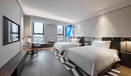 Habitación básica con 2 camas individuales