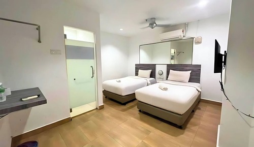 Habitación con 2 camas individuales