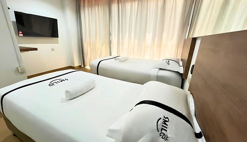 Habitación con 2 camas individuales