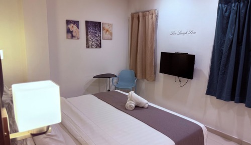 Habitación cuádruple Deluxe