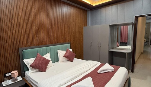 Habitación Elite con 1 cama doble o 2 individuales