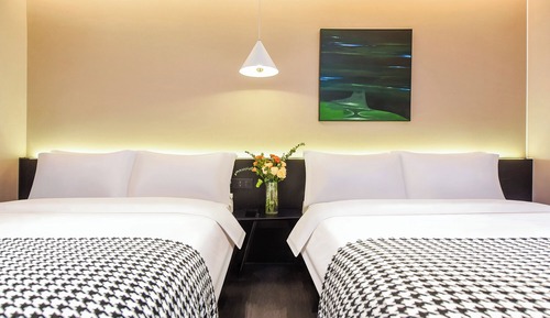 Habitación básica con 2 camas individuales