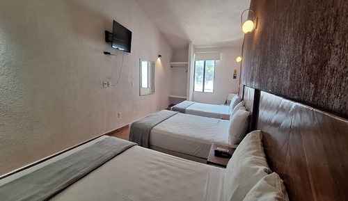 Habitación triple estándar, varias camas