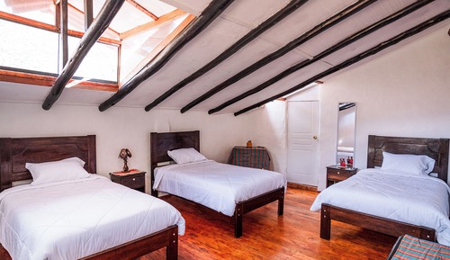 Habitación triple básica, vistas al jardín