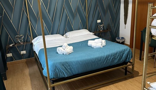 Habitación cuádruple Deluxe, balcón, vistas parciales al mar