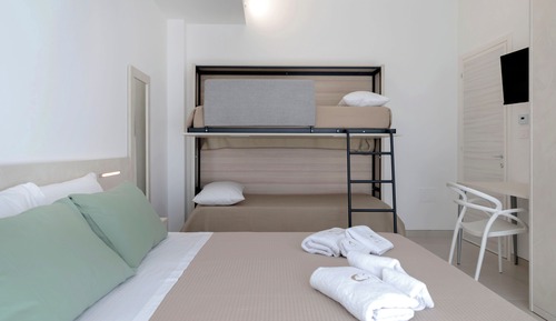 Habitación cuádruple familiar, en una planta alta