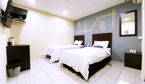Habitación con 2 camas individuales