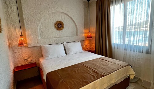 Habitación junior doble, Se admiten mascotas, frente a la playa
