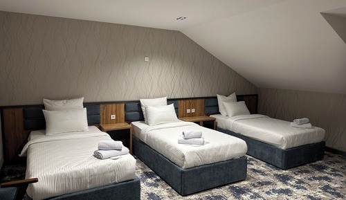 Habitación triple Deluxe