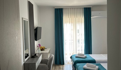 Habitación triple Deluxe, balcón, vistas a la ciudad