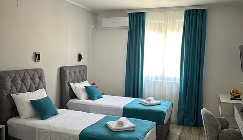 Habitación triple Deluxe, vistas a la ciudad