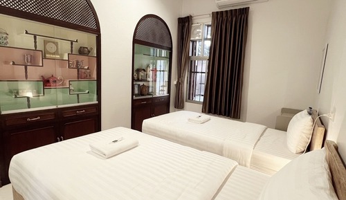 Habitación clásica con 2 camas individuales