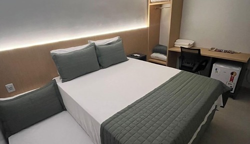 Habitación triple Premium, varias camas