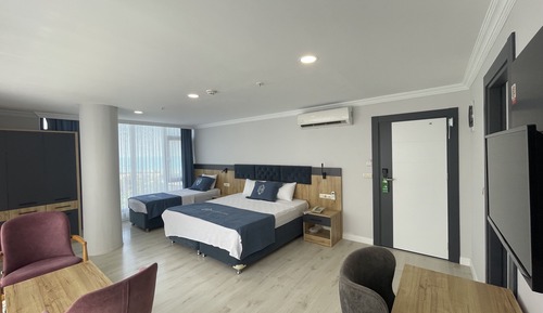 Habitación triple Deluxe, vistas al mar