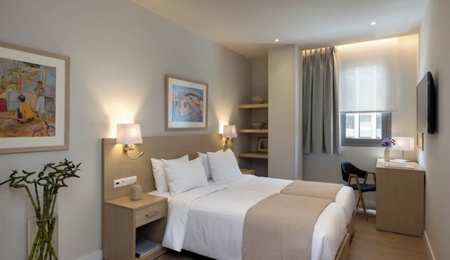 Habitación clásica con 1 cama doble o 2 individuales, vistas a la ciudad