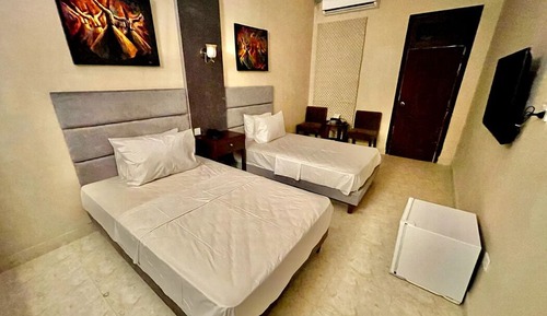 Habitación Deluxe con 1 cama doble o 2 individuales