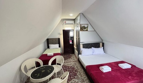 Habitación triple Deluxe