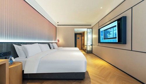 Habitación superior con 2 camas individuales, vistas a la ciudad