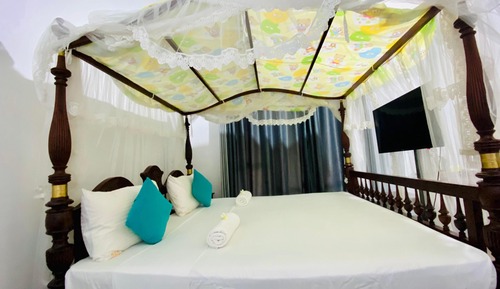 Habitación triple estándar, vistas al jardín