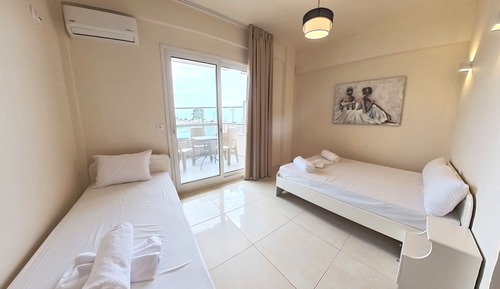 Habitación triple económica, balcón, vistas al mar