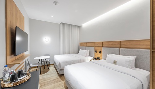 Habitación Signature con 2 camas individuales