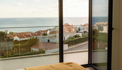 Habitación superior con 1 cama doble o 2 individuales, vistas al mar