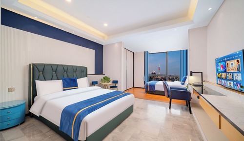 Habitación ejecutiva con 2 camas individuales, vistas a la ciudad