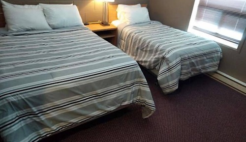 Habitación doble, varias camas
